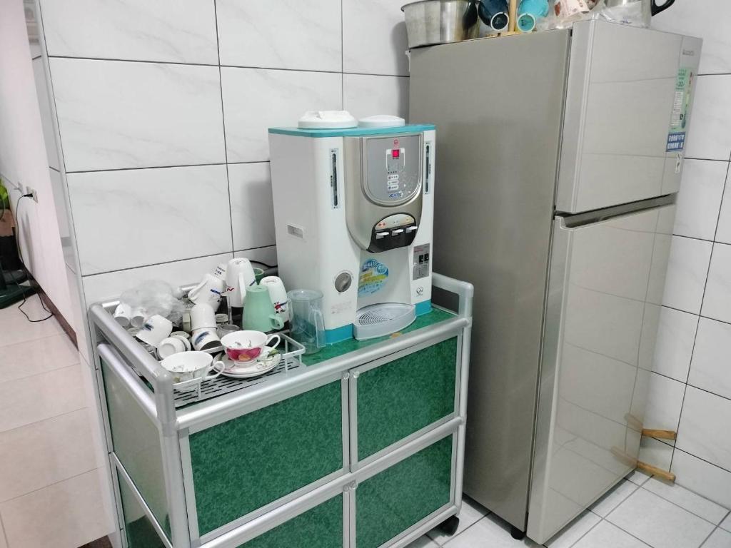 Kuchyň nebo kuchyňský kout v ubytování Happy Inn