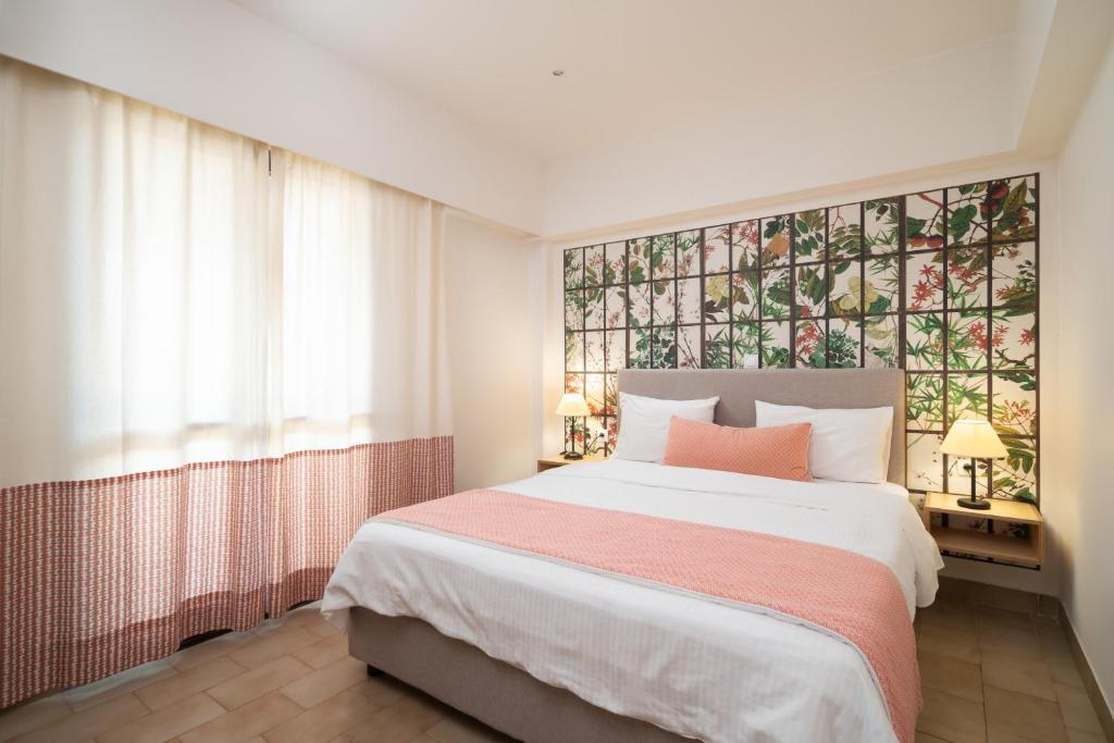Postel nebo postele na pokoji v ubytování Monemvasia Green Apartments