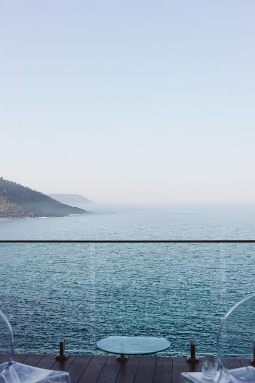 a view of the ocean from a house at The Deck House Wye River in Wye River