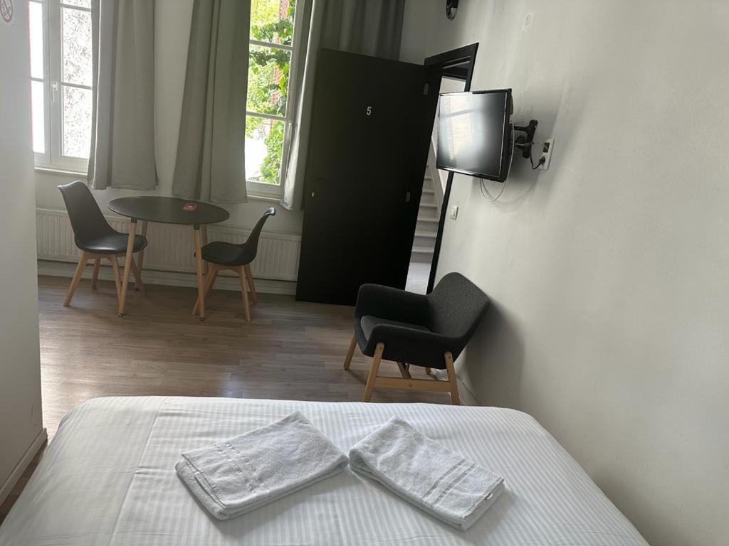 Postel nebo postele na pokoji v ubytování BED Collège