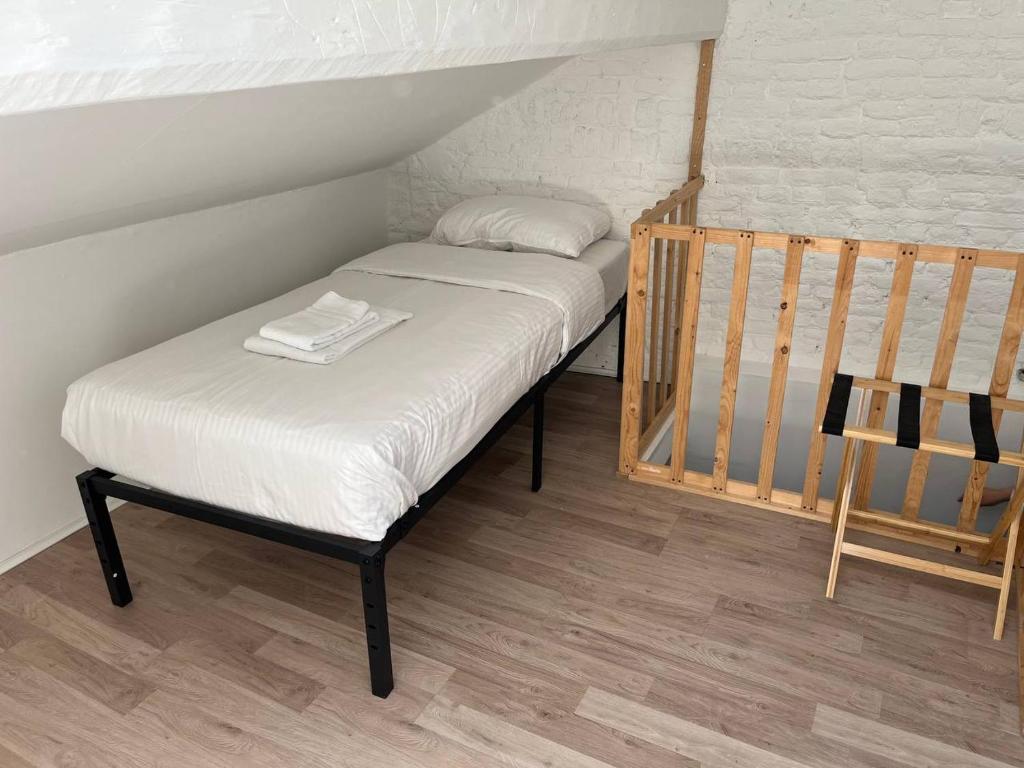 Postel nebo postele na pokoji v ubytování BED Collège
