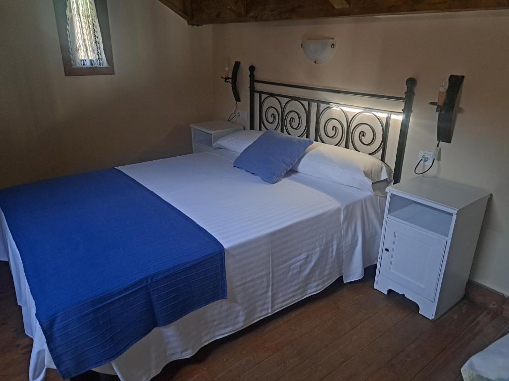 Postel nebo postele na pokoji v ubytování Casa Arruebo