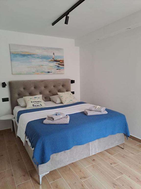 Postel nebo postele na pokoji v ubytování Studio Apartments Leut & Lanterna