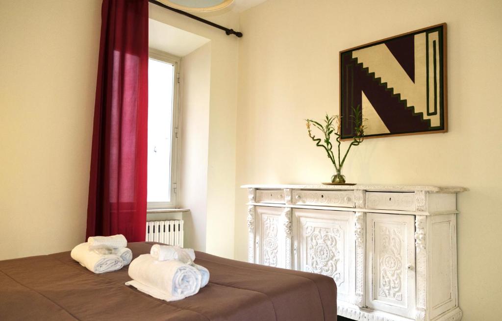 Łóżko lub łóżka w pokoju w obiekcie Appartamento in pieno centro Roma - Lily's House