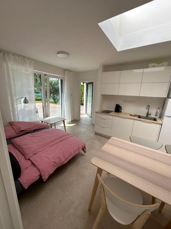 Postel nebo postele na pokoji v ubytování Red Travel Apartment