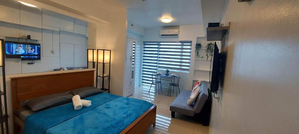 De Luxe, Standard and Studio Suites -The Breeze Residences-close to Airport,Mall of Asia, US Embassy - 阳台工作室