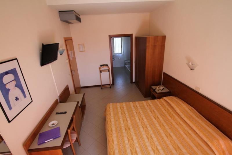 TV a/nebo společenská místnost v ubytování Hotel Montecarlo
