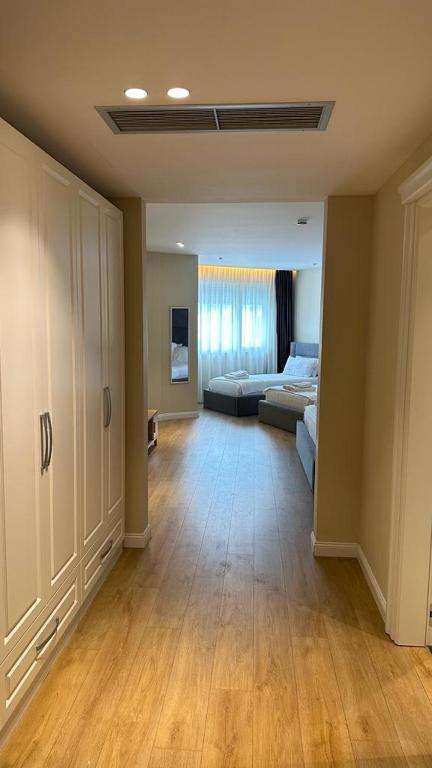 Llit o llits en una habitació de Granda Hotel