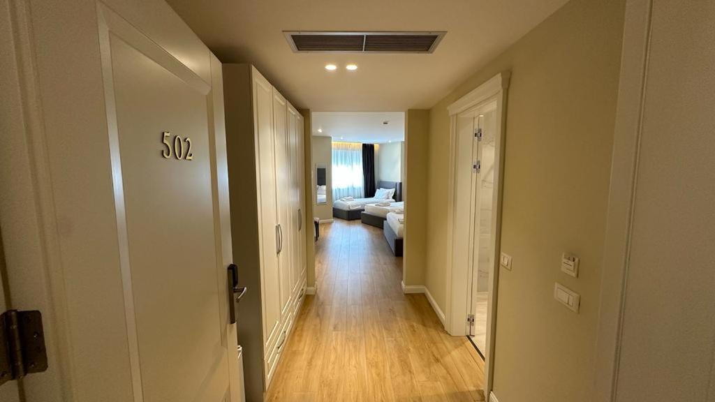 Llit o llits en una habitació de Granda Hotel