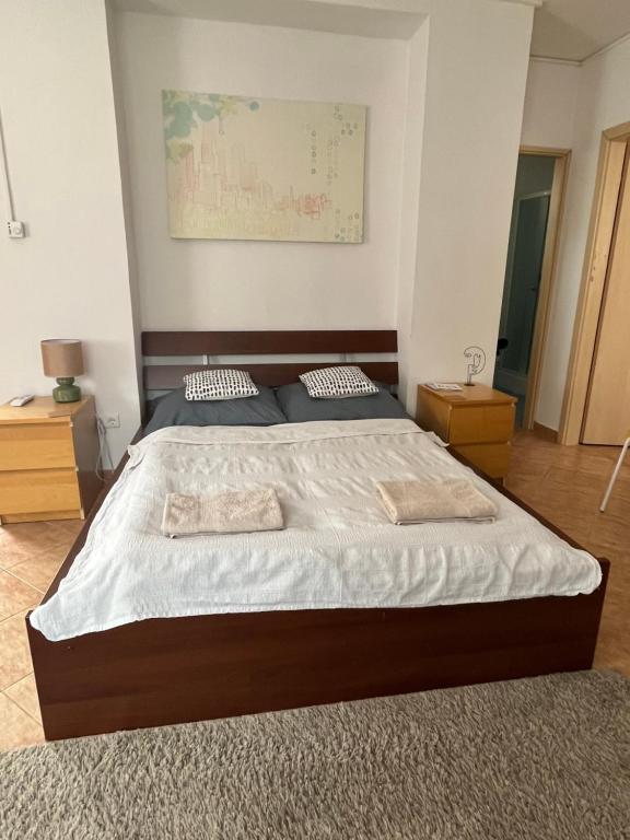 Postel nebo postele na pokoji v ubytování Wash House Apartman