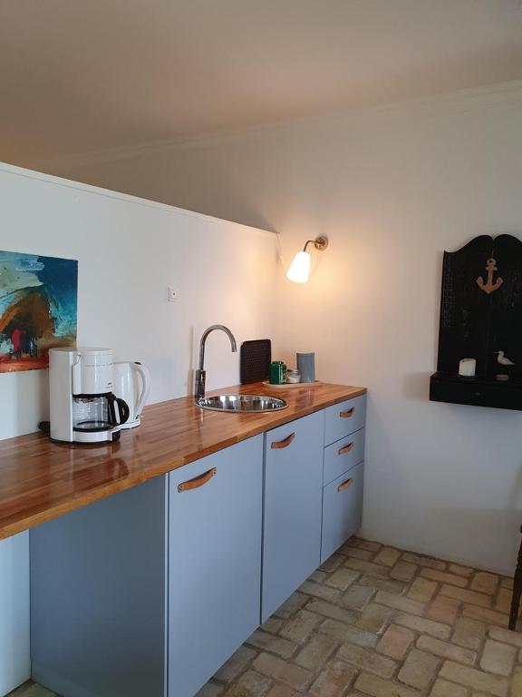 Kuchyň nebo kuchyňský kout v ubytování Hotel Brummers Anneks