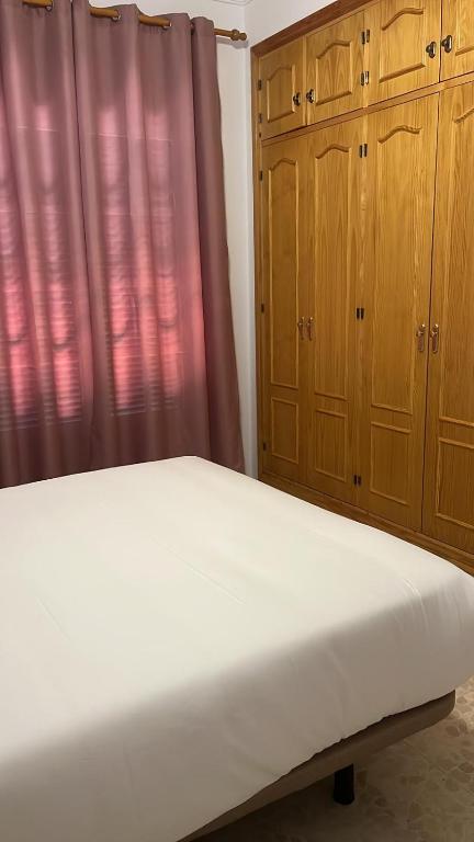 Postel nebo postele na pokoji v ubytování VILLA LA MOMITA