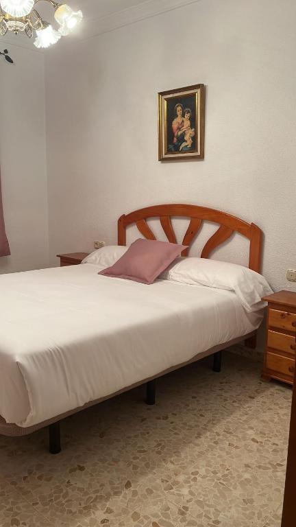 Postel nebo postele na pokoji v ubytování VILLA LA MOMITA