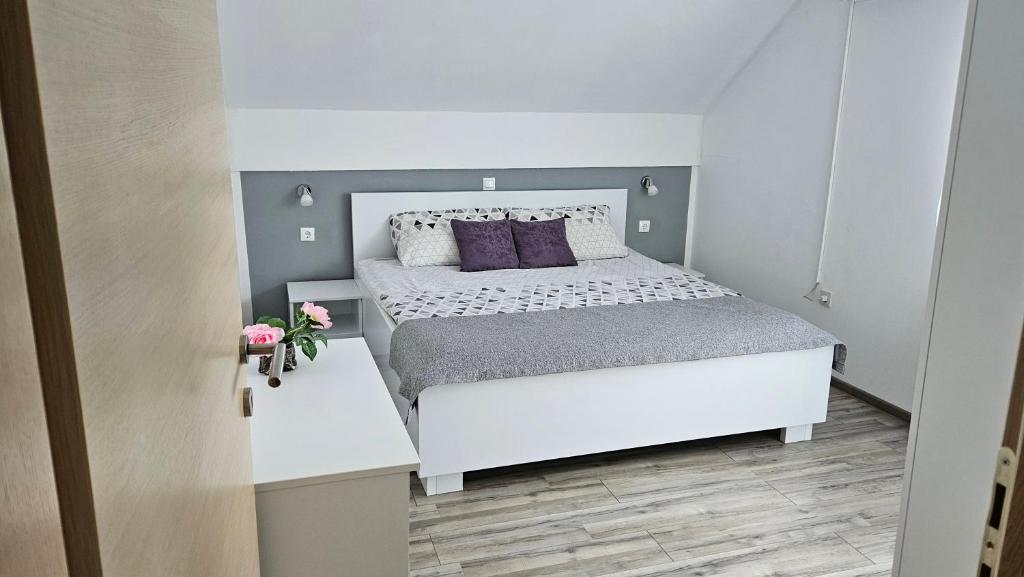Postel nebo postele na pokoji v ubytování Apartment Andrea