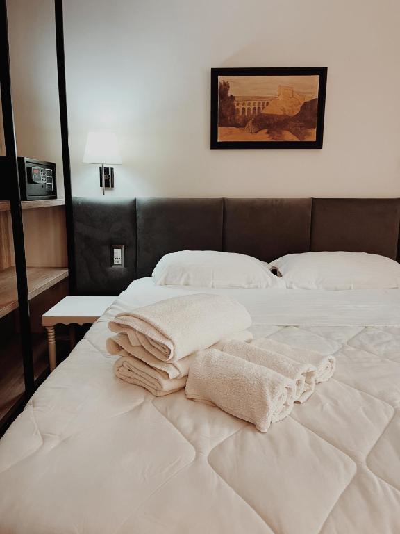 Postel nebo postele na pokoji v ubytování Ruby Palace