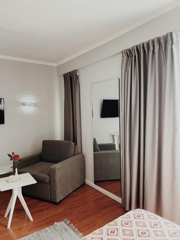 TV a/nebo společenská místnost v ubytování Ruby Palace