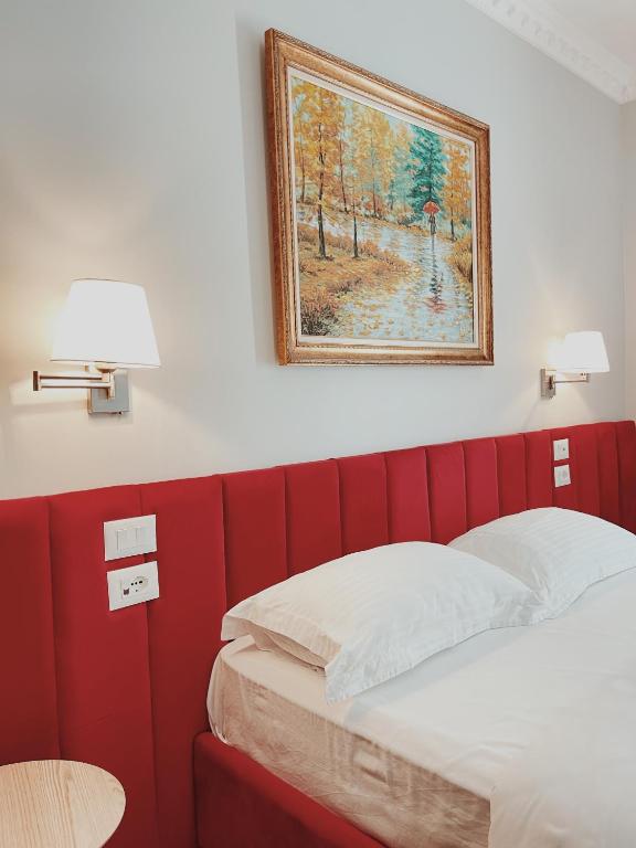 Postel nebo postele na pokoji v ubytování Ruby Palace