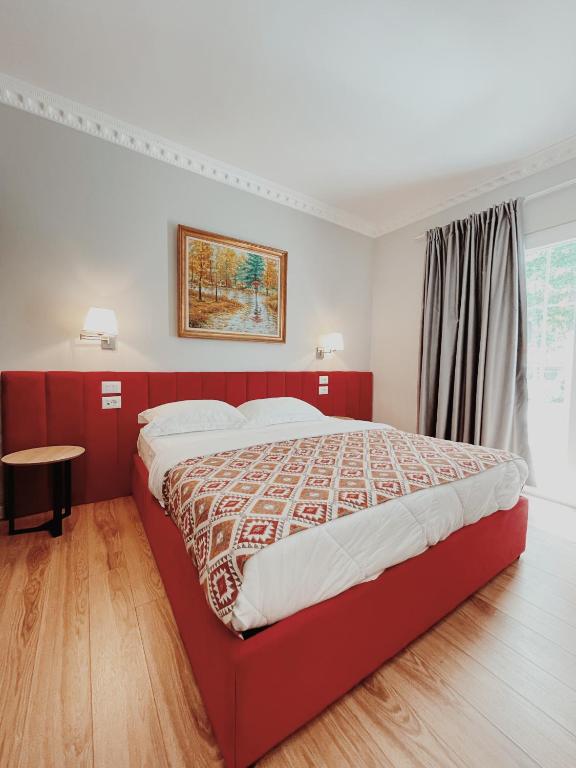 Postel nebo postele na pokoji v ubytování Ruby Palace