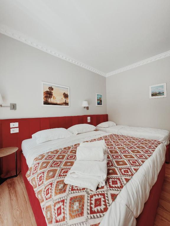 Postel nebo postele na pokoji v ubytování Ruby Palace