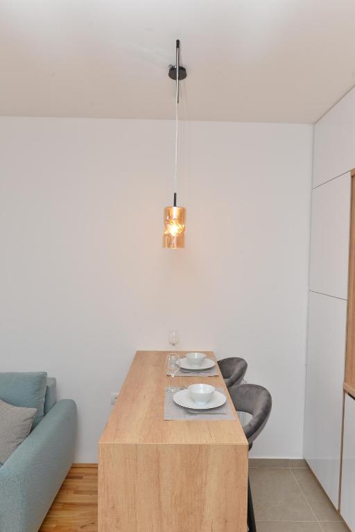 Posezení v ubytování HM Apartments