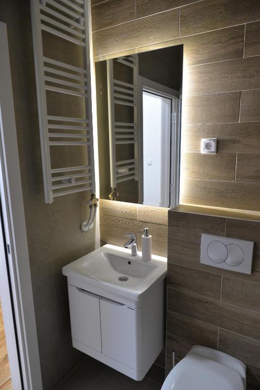 Koupelna v ubytování HM Apartments