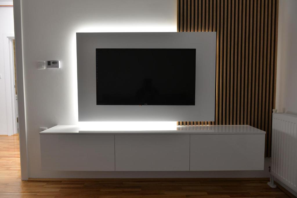 TV a/nebo společenská místnost v ubytování HM Apartments