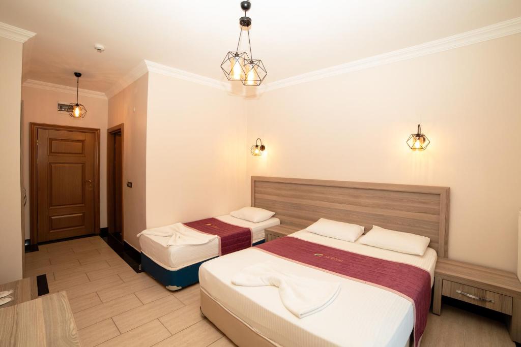Kuzey Park Hotel - Dreifachzimmer Mit Gartenansicht