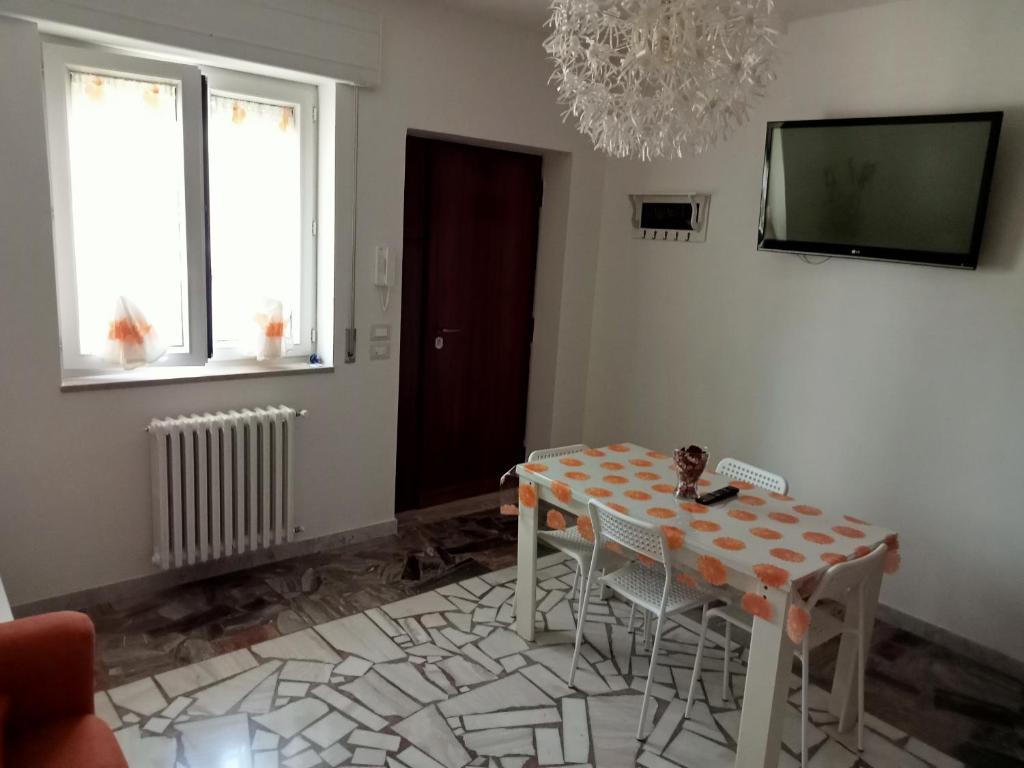 TV a/nebo společenská místnost v ubytování Relax in valle