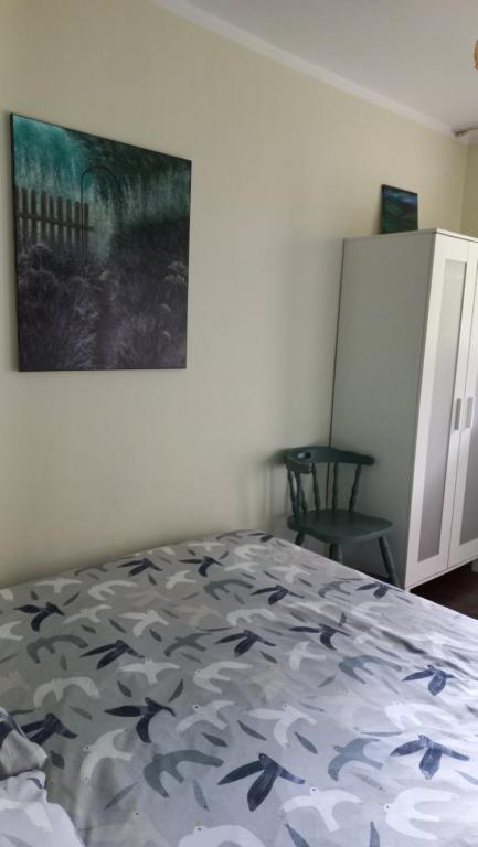 Posteľ alebo postele v izbe v ubytovaní Global Trip Apartament stadion zimowy
