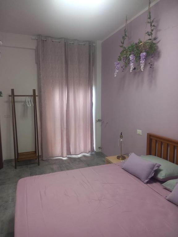 Postel nebo postele na pokoji v ubytování Le Stanze di Bimba