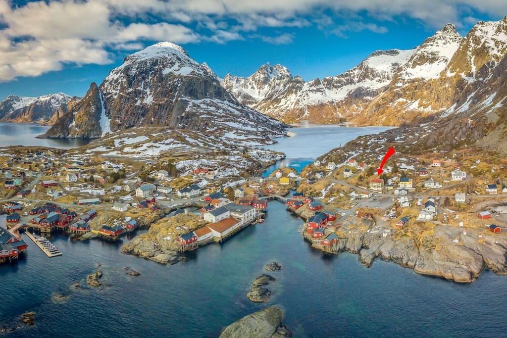 an aerial view of a small town in the mountains at Å, the far end of Lofoten. in Moskenes