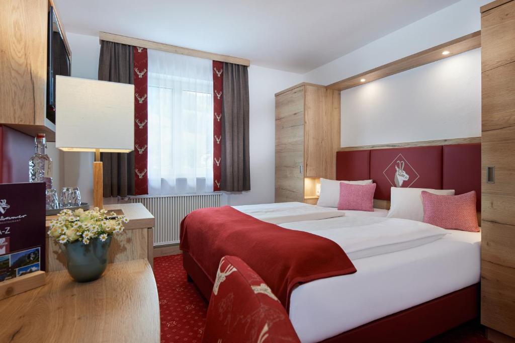Postel nebo postele na pokoji v ubytování Hotel Kerschbaumer