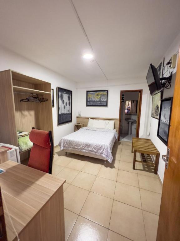 Postel nebo postele na pokoji v ubytování ApartHotel Maison Suisse