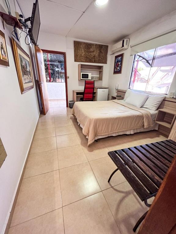 Postel nebo postele na pokoji v ubytování ApartHotel Maison Suisse