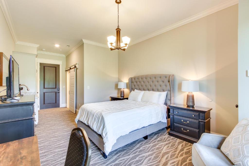 a bedroom with a bed and a couch and a television at Keestone Studio with Resort Amenities! in Loretto