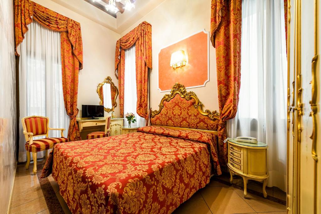 TV a/nebo společenská místnost v ubytování Hotel Al Vagon