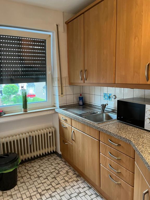 Kuchyň nebo kuchyňský kout v ubytování Apartment 1868
