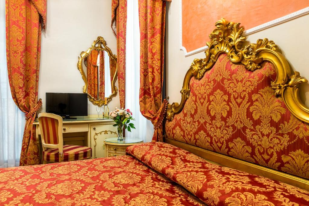 TV a/nebo společenská místnost v ubytování Hotel Al Vagon
