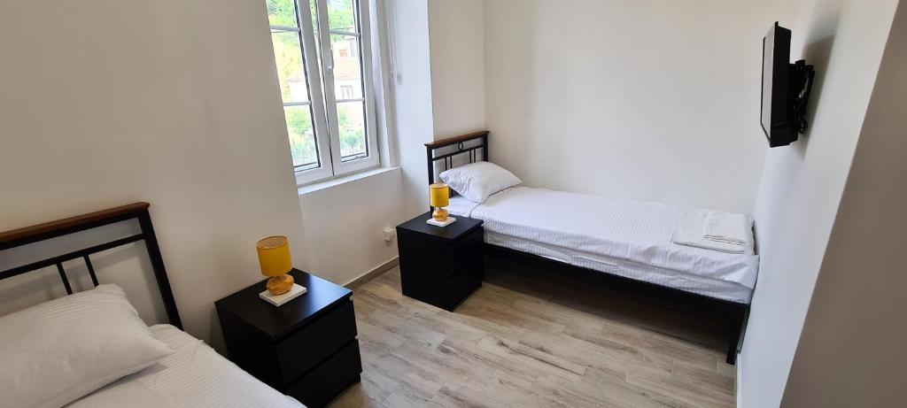 Postel nebo postele na pokoji v ubytování Rajski Horiznonti - Rooms Ram