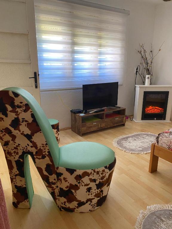 TV a/nebo společenská místnost v ubytování KOD BAKE