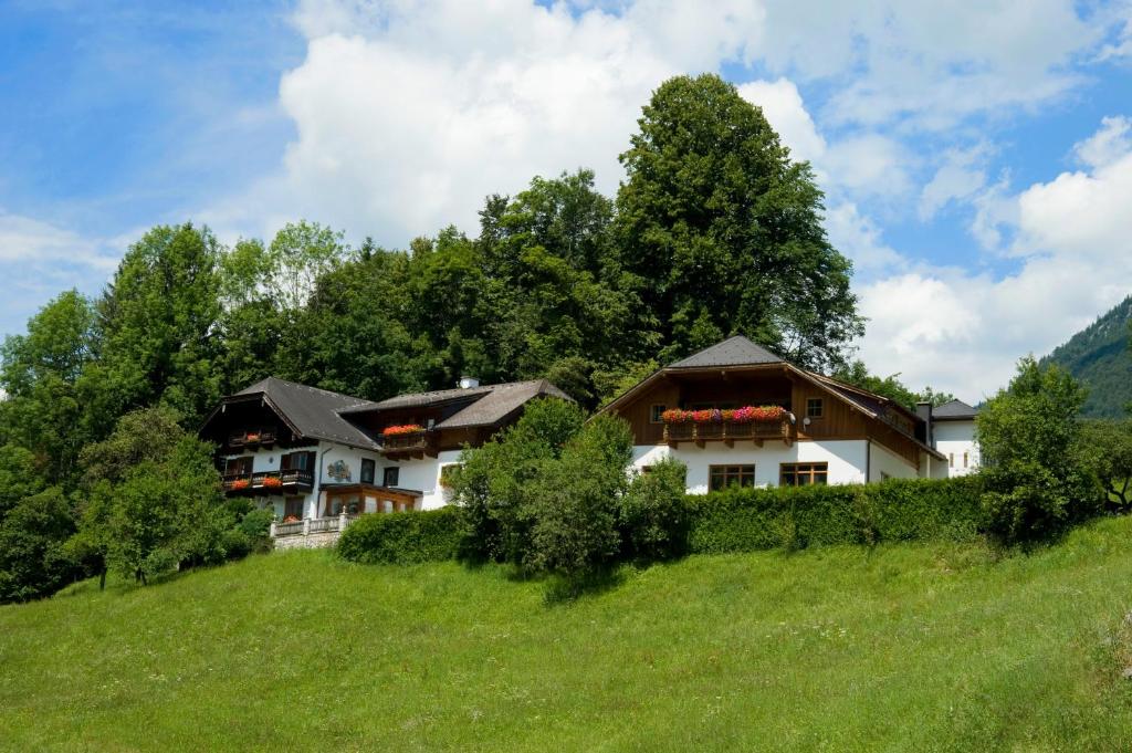 a house on the side of a hill at Gästehaus Kasbichler in St. Wolfgang