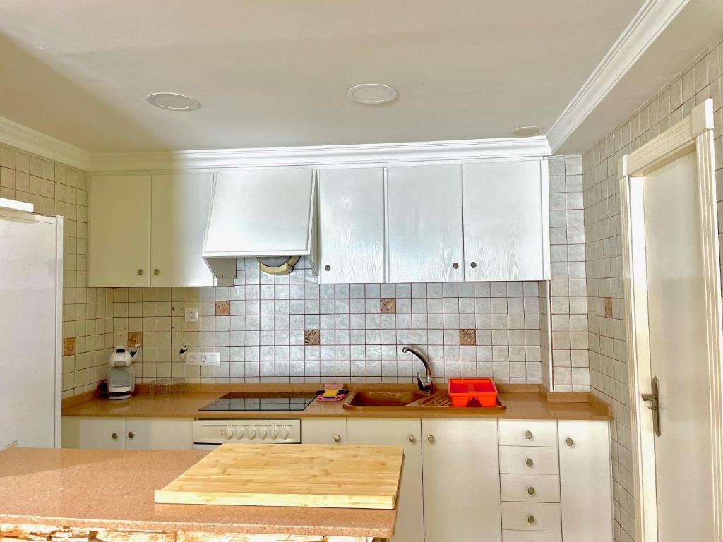 Kuchyň nebo kuchyňský kout v ubytování Apartamento Cid