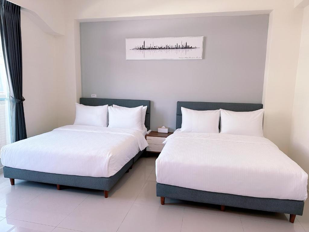 Letto o letti in una camera di Happy Fat B&B 寵物友善