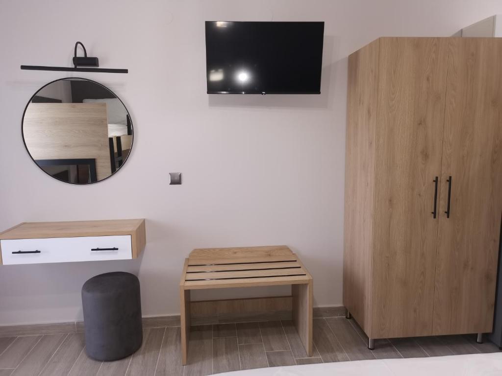 Televízia a/alebo spoločenská miestnosť v ubytovaní Katerina's Resort