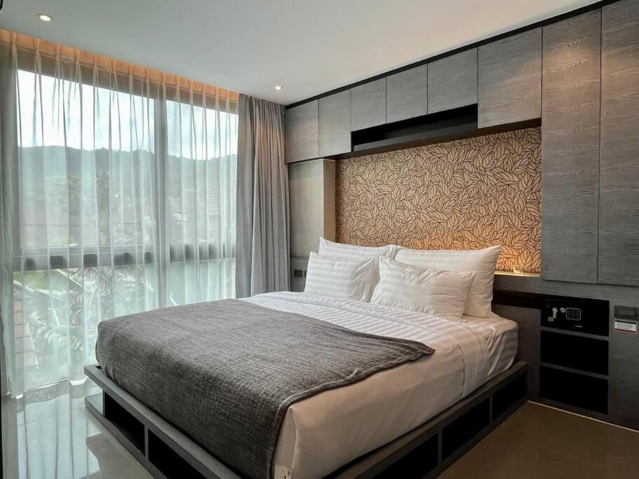 Postel nebo postele na pokoji v ubytování Kamala Beach D49 Exclusive Junior Suite