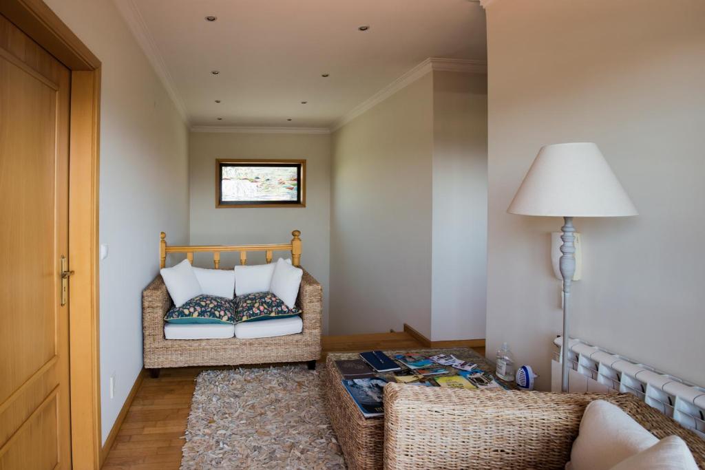 Postel nebo postele na pokoji v ubytování Quarto em Viana do Castelo