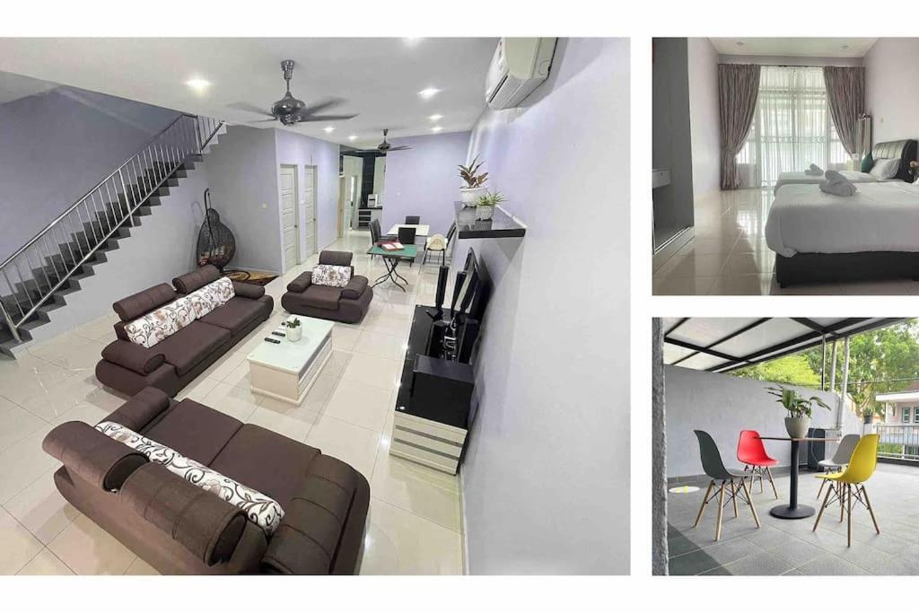 uma sala de estar com um sofá e uma cama em JJ&KK Homestay em Taiping