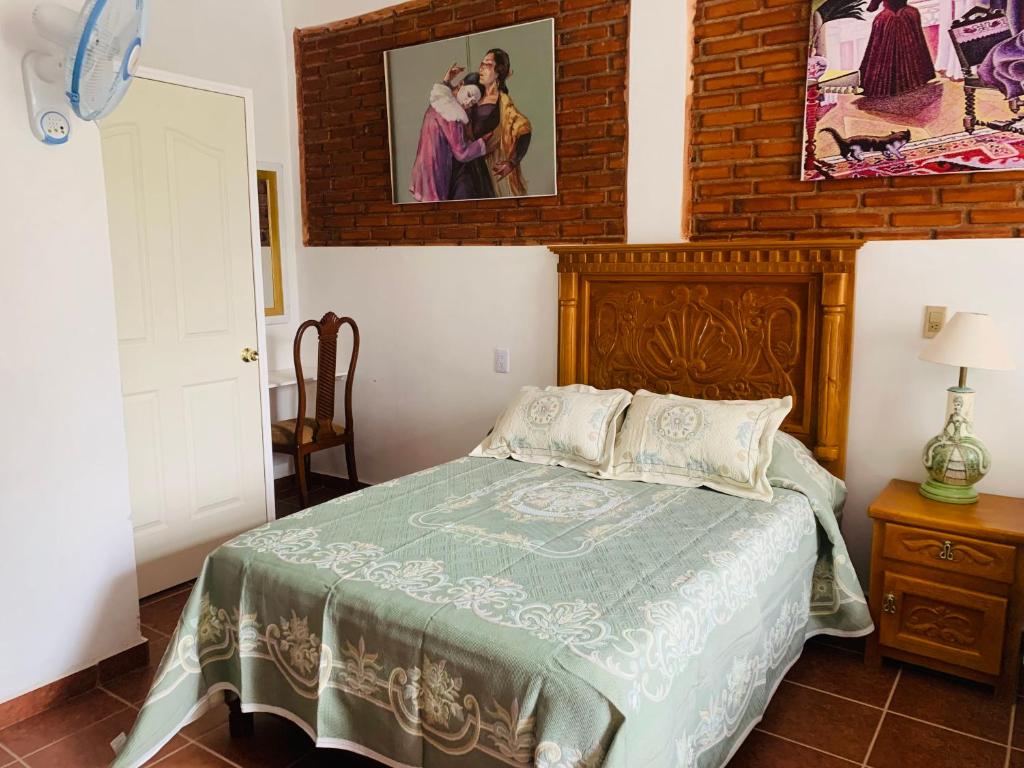 Postel nebo postele na pokoji v ubytování Hotel Boutique Casona Mashei