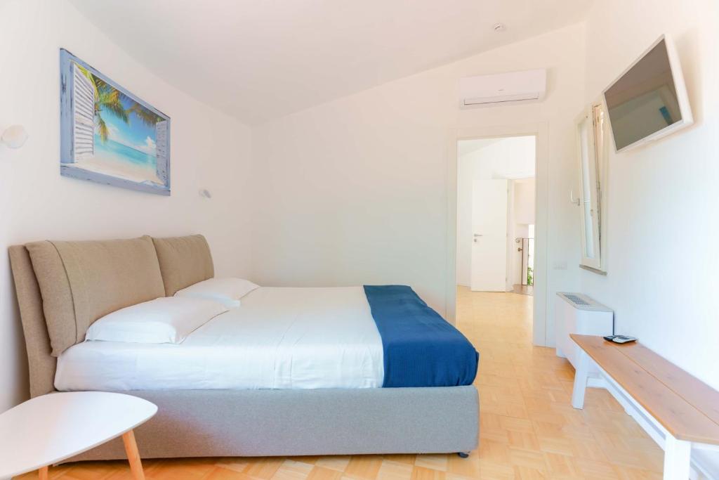 Łóżko lub łóżka w pokoju w obiekcie B&B Villa Zola