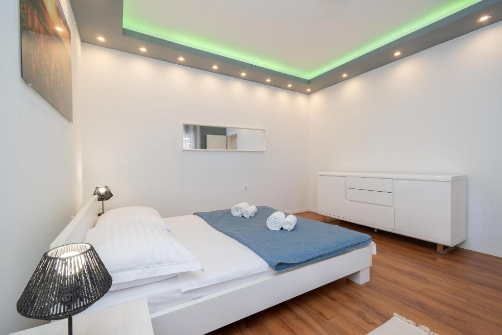 Postel nebo postele na pokoji v ubytování Apartment Dalmatino